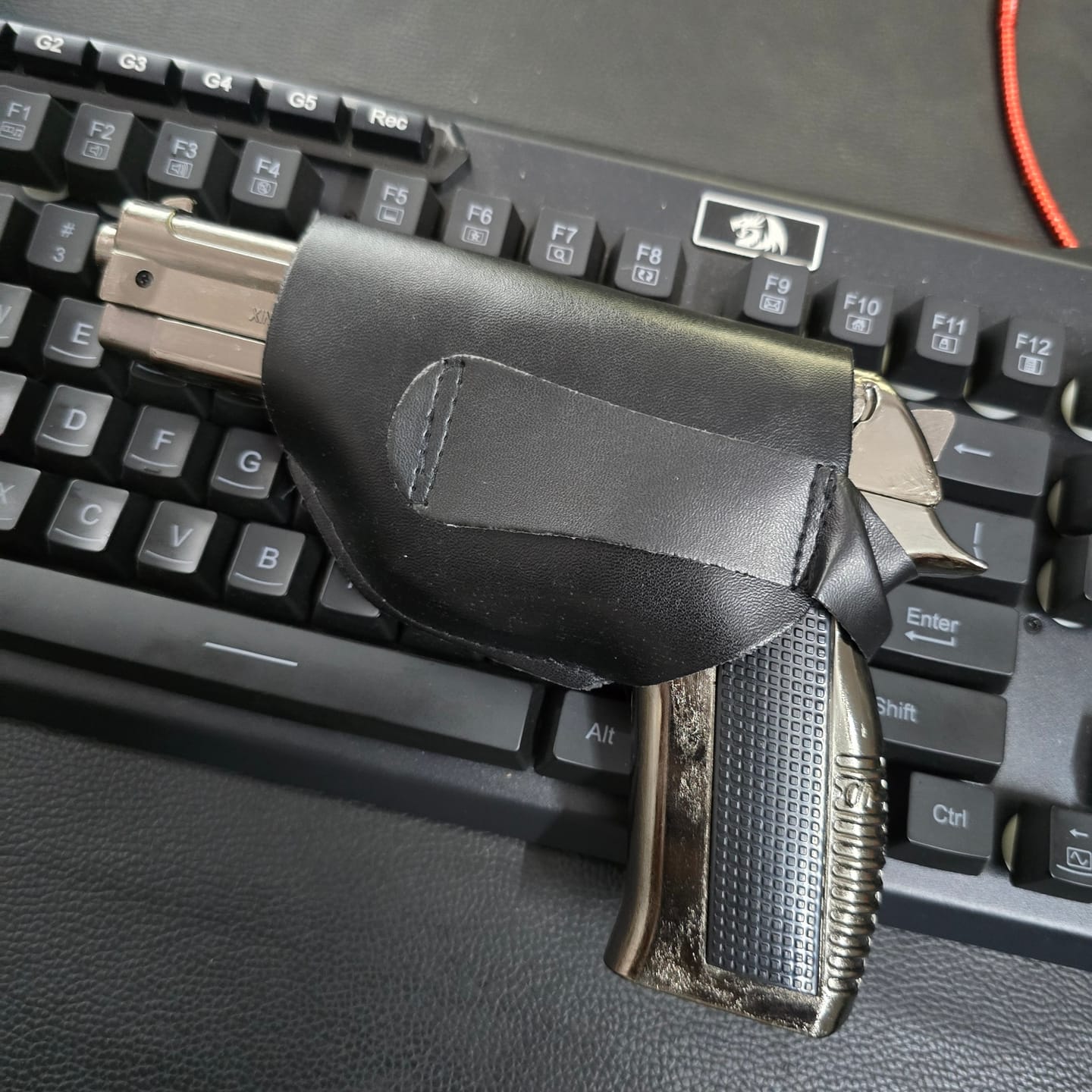 Customer photo review of ALA FLAME 608 Reloaded Gun Lighter – Heavy Metal Windproof Jet Flame Lighter