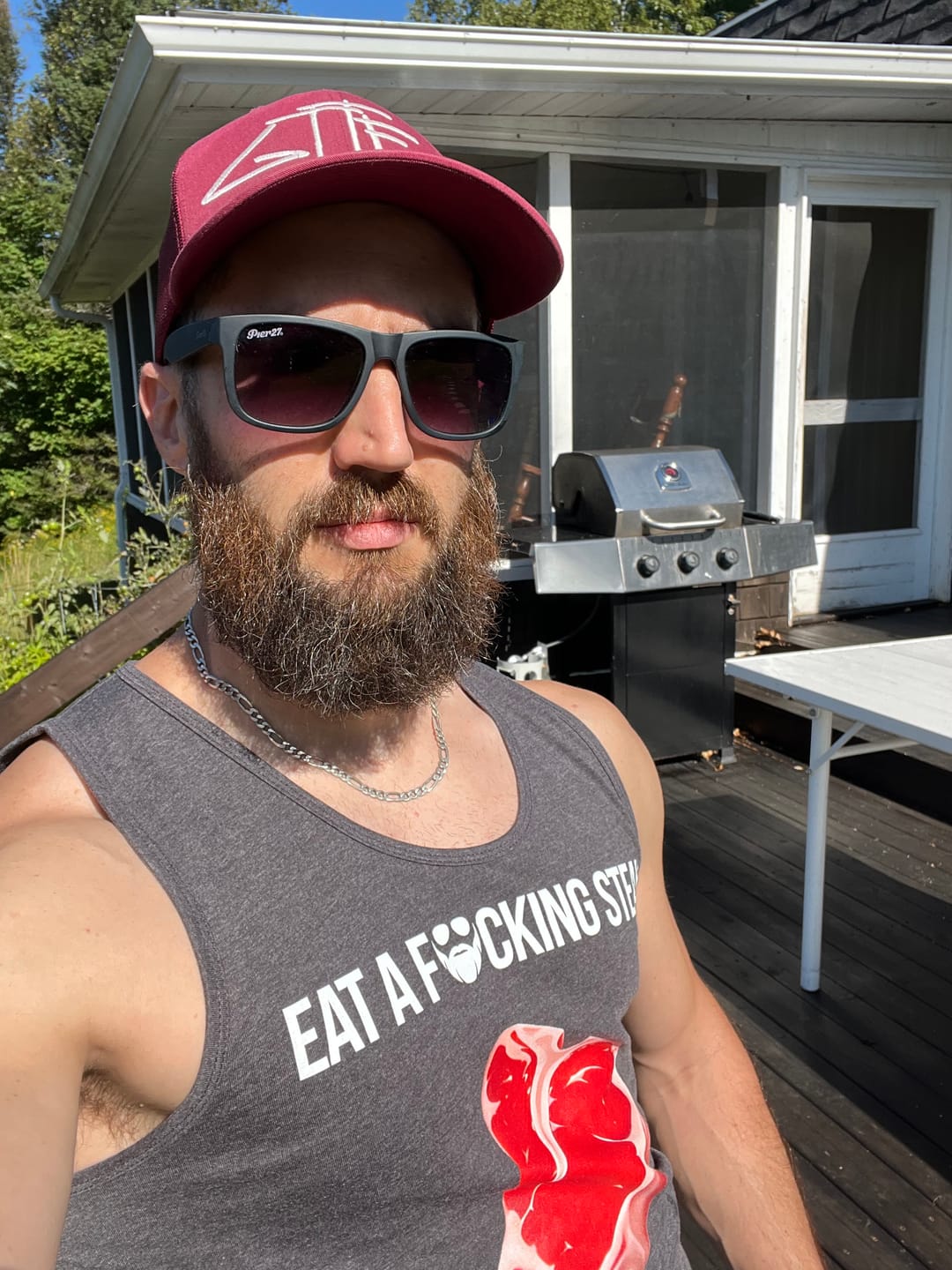 Customer photo review of Eat a F*cking Steak Premium Tank Top
