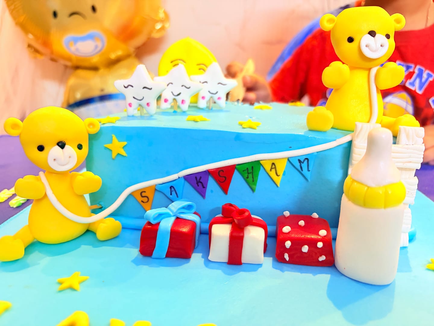 Customer photo review of Teddy 6 Months Cake