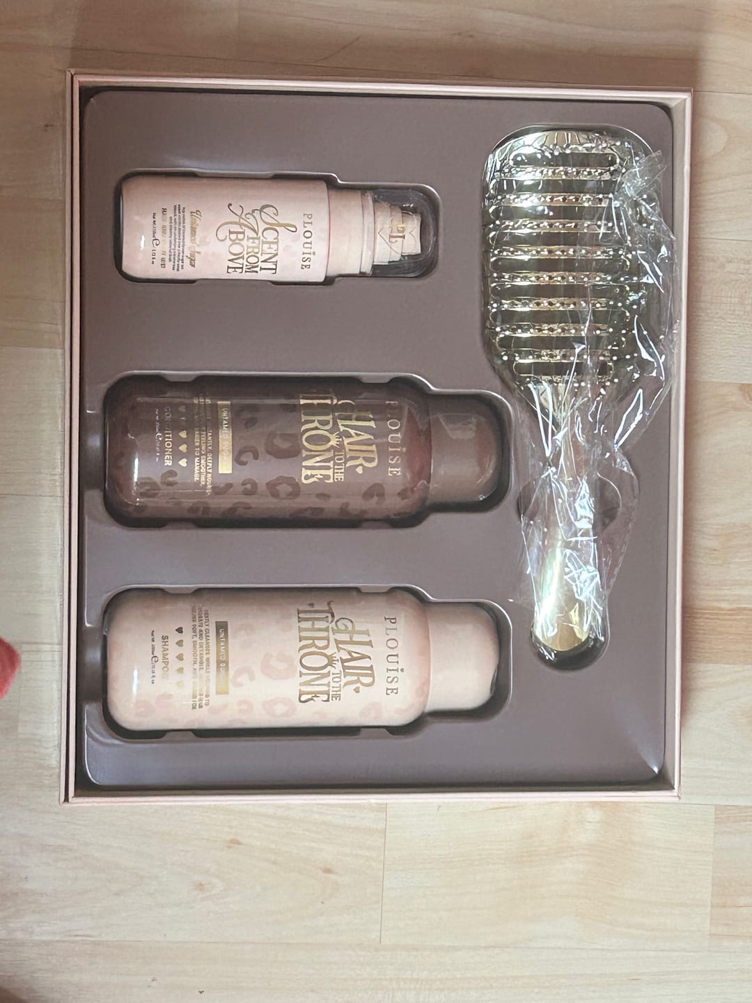 Customer photo review of Cheetah Claim To Tame Hair Care Set