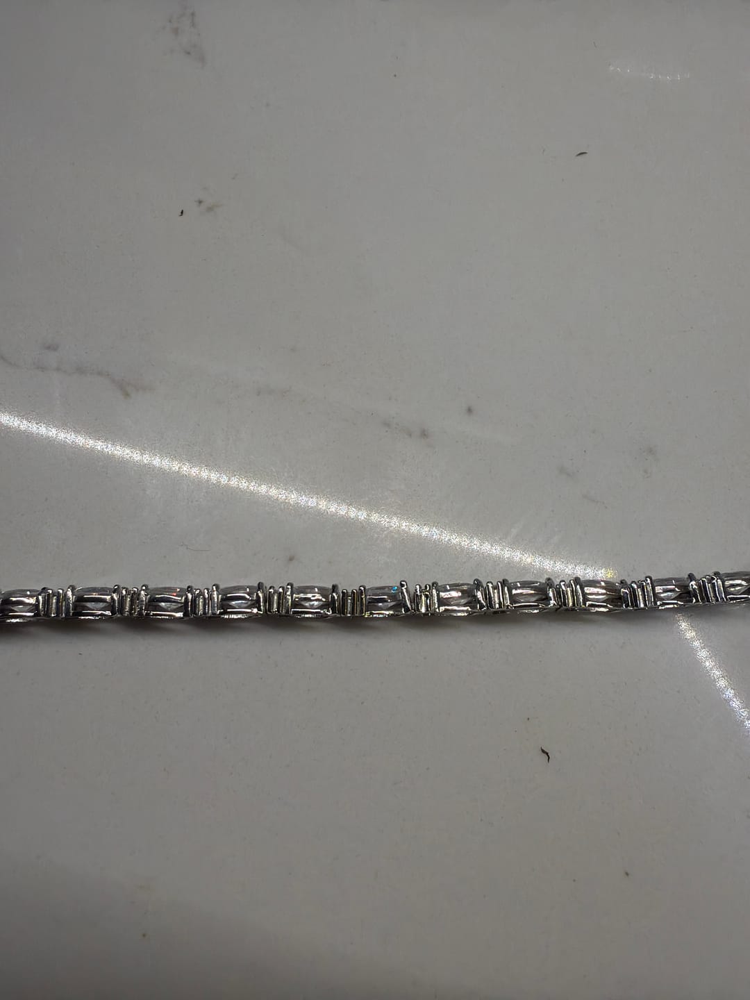 Customer photo review of 5MM Moissanite Mixed Oval Cut Tennis Chain - Silver - D Color - IF