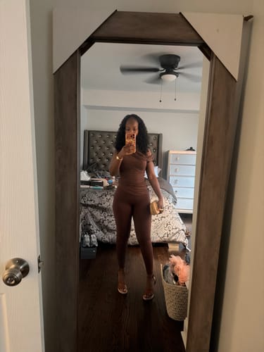 Customer's brown Naked High Waist Leggings and matching top worn in a bedroom mirror selfie.