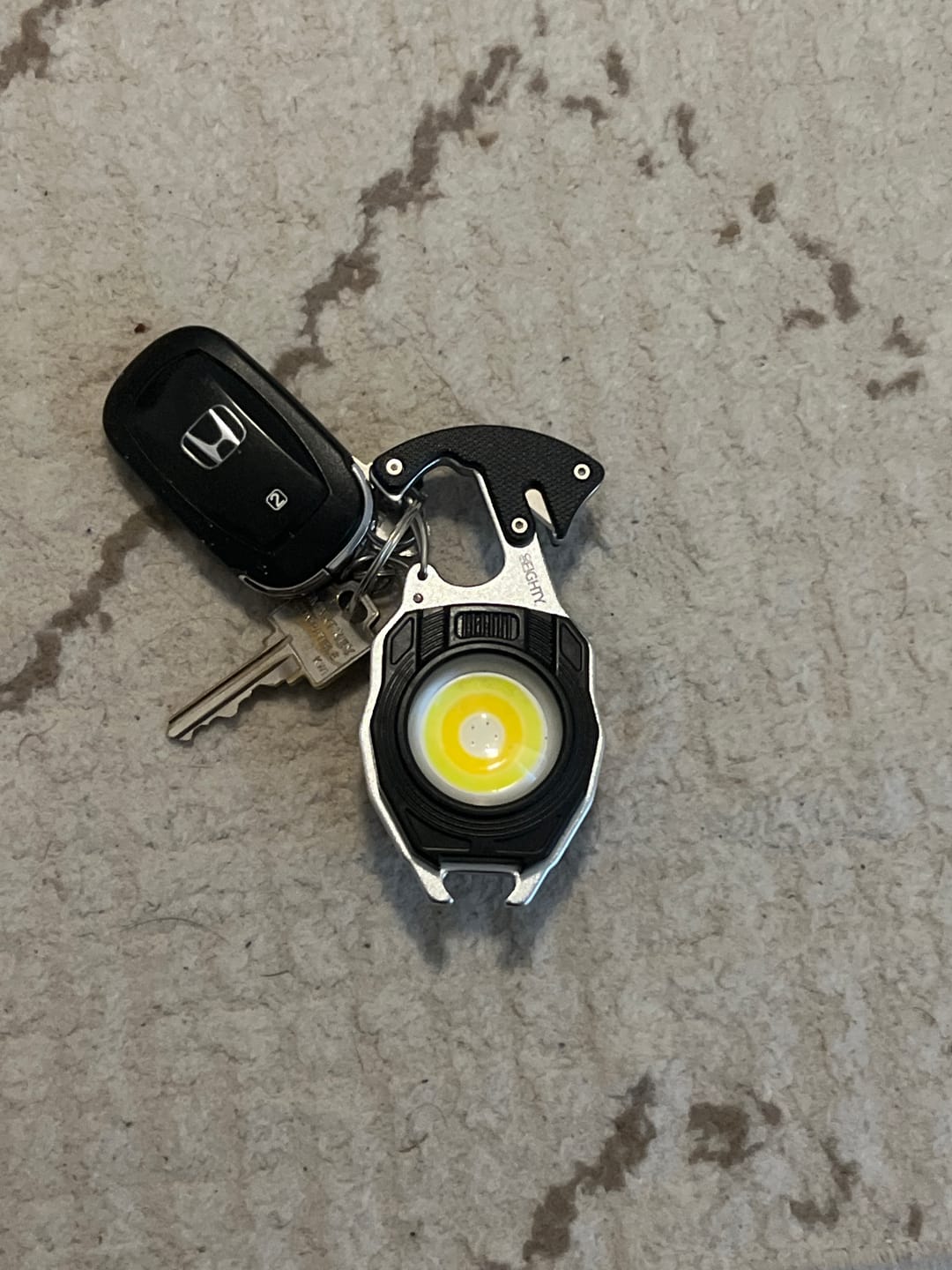 Customer photo review of 80Eighty® Flashlight Keychain