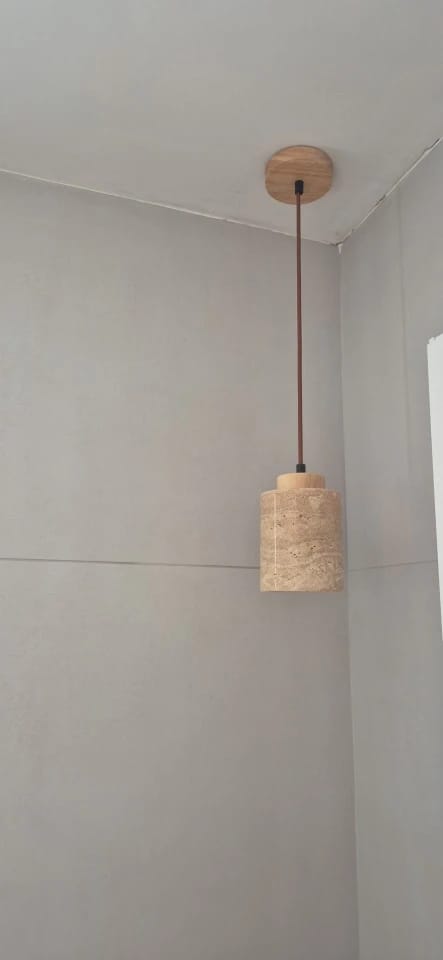 Customer photo review of Stone Pendant Light With Textured Shade And Wooden Accent 12 Inch