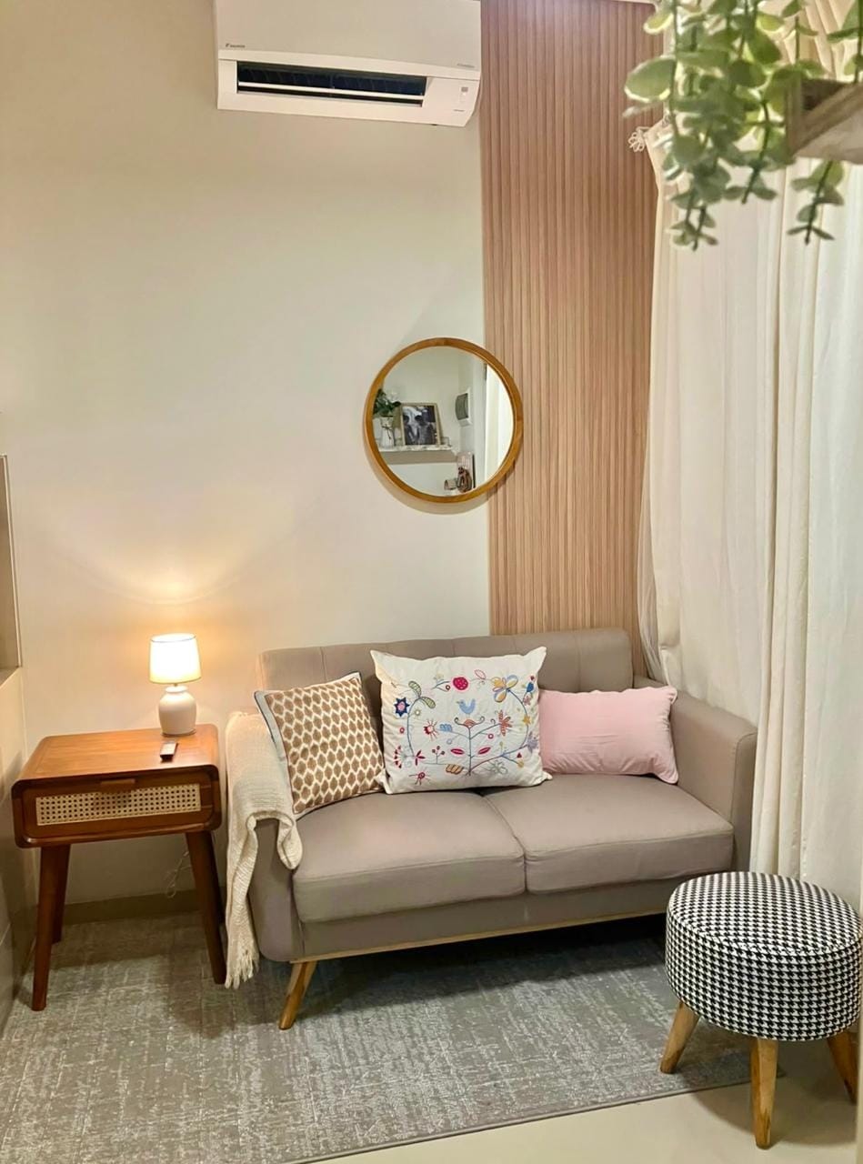 Customer photo review of Teak Side Table with Premium Rattan Accent