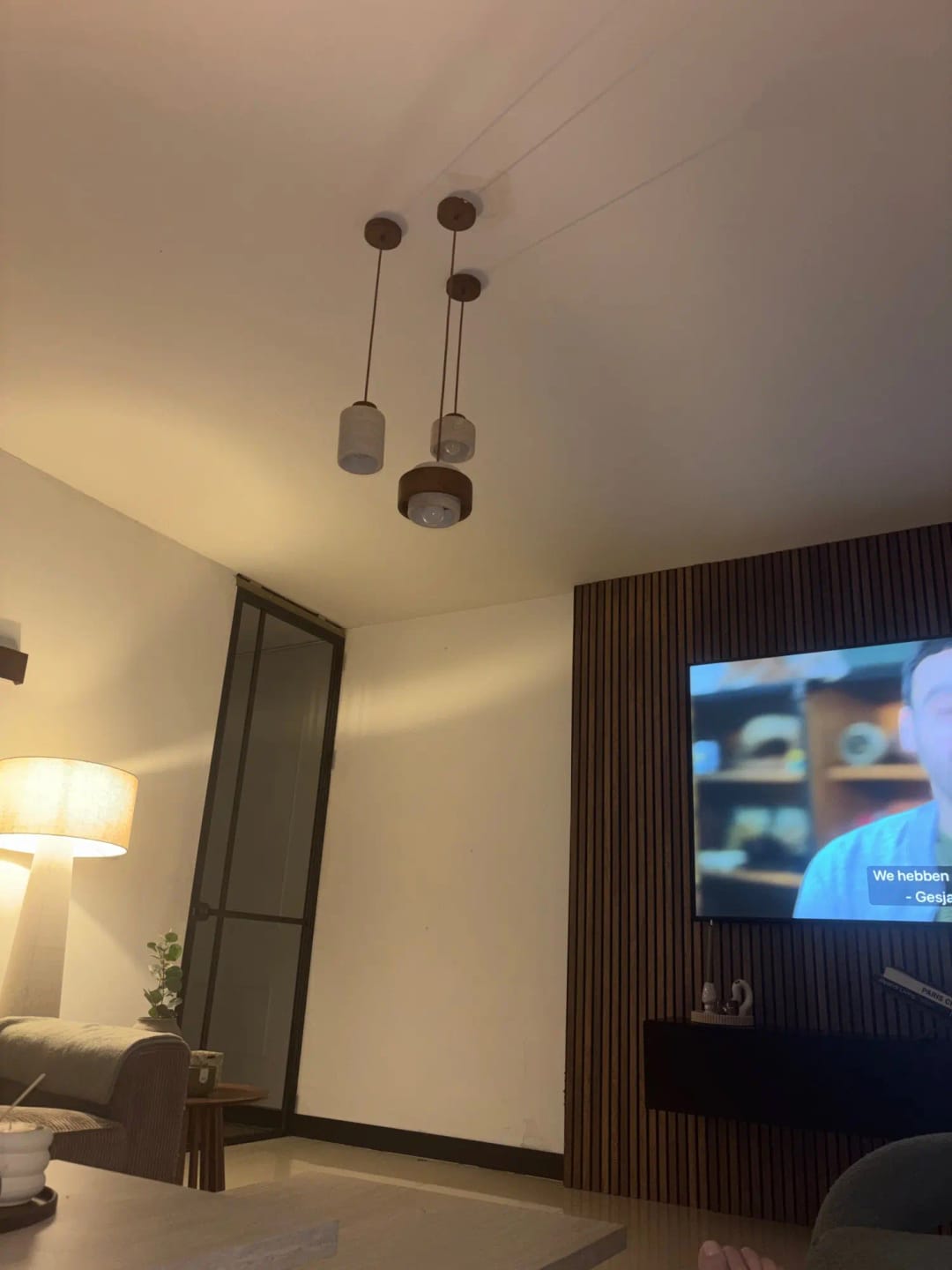 Customer photo review of Stone Pendant Light With Textured Shade And Wooden Accent 12 Inch