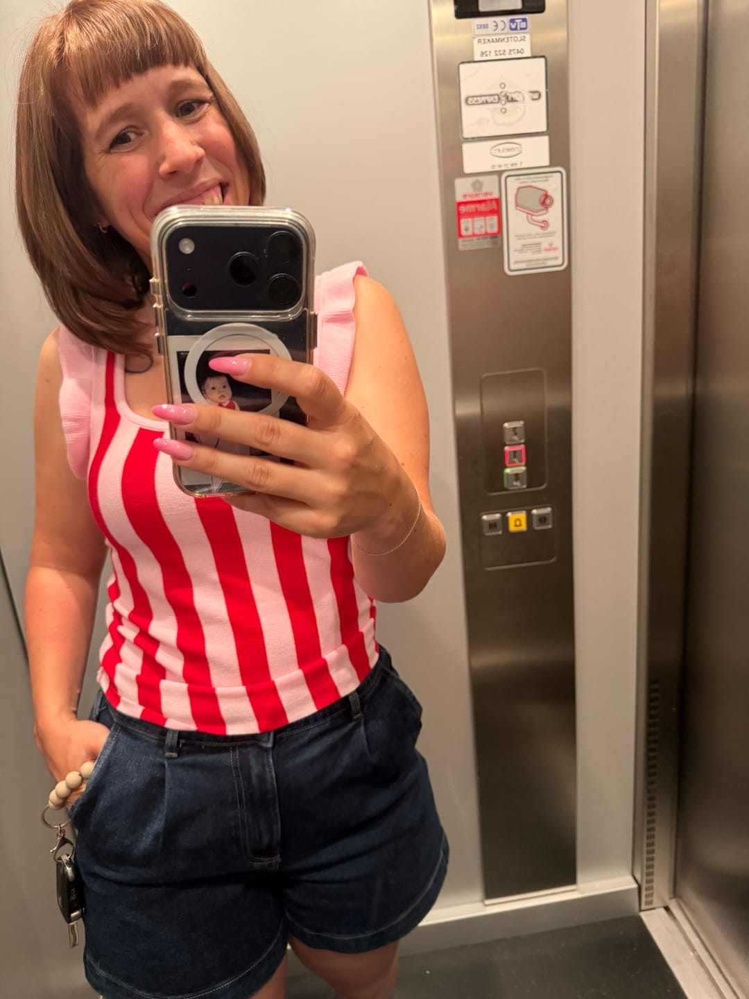 Customer photo review of LOVELY RUFFLE TOP - RED/PINK STRIPES