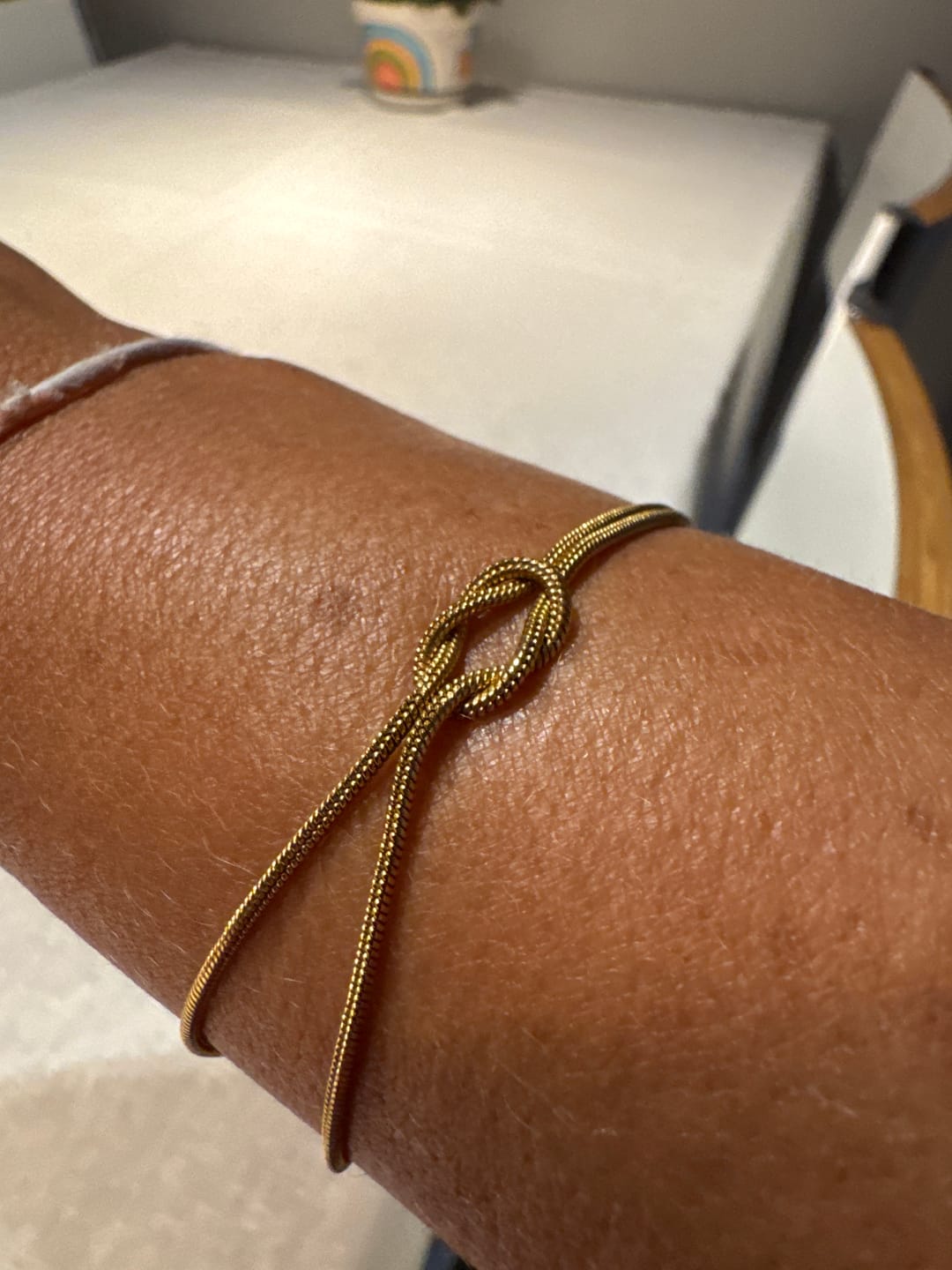 Customer photo review of Pulseira Nó Eterno