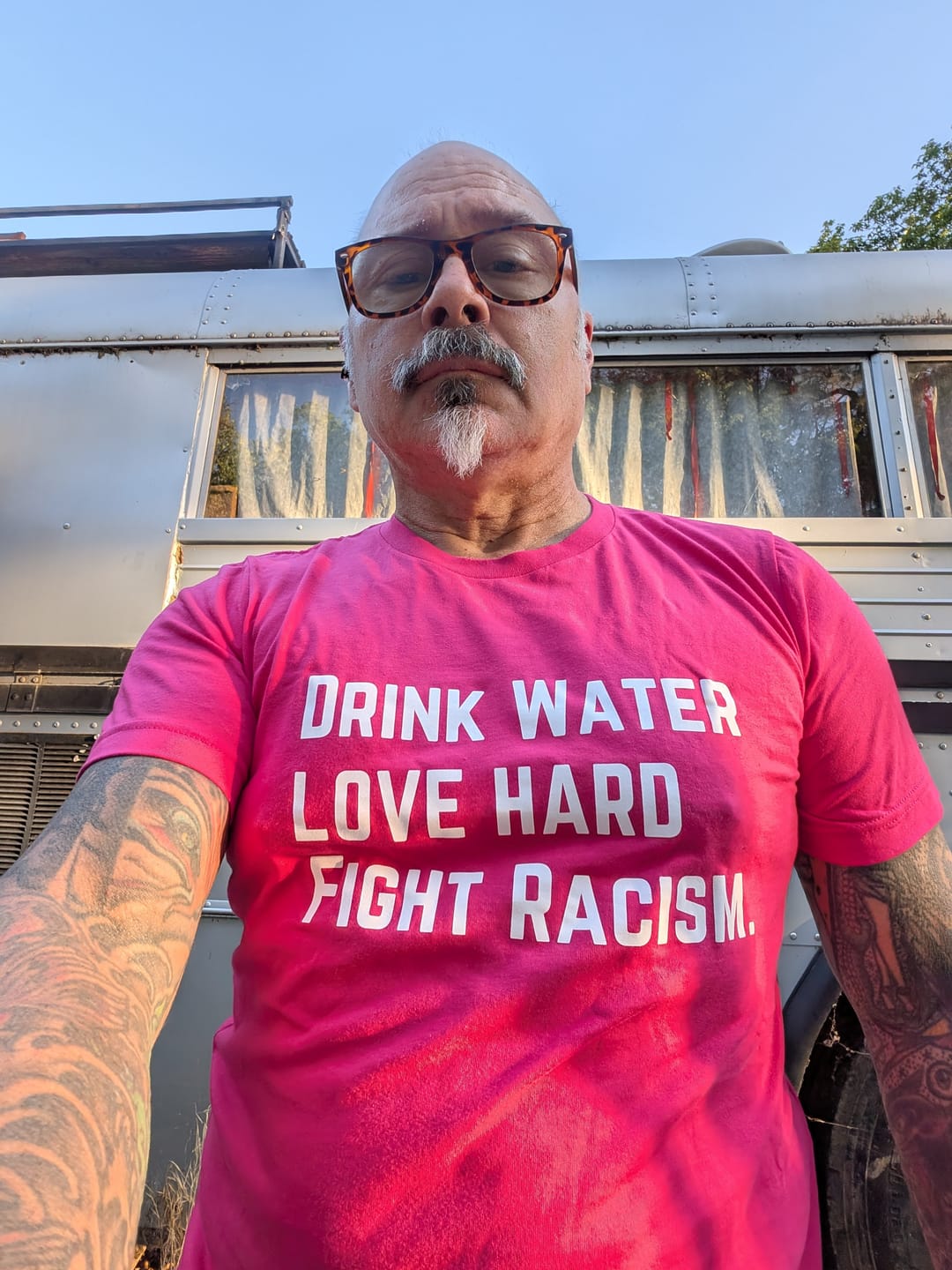 Customer photo review of Drink Water Fight Racism Unisex T-shirt