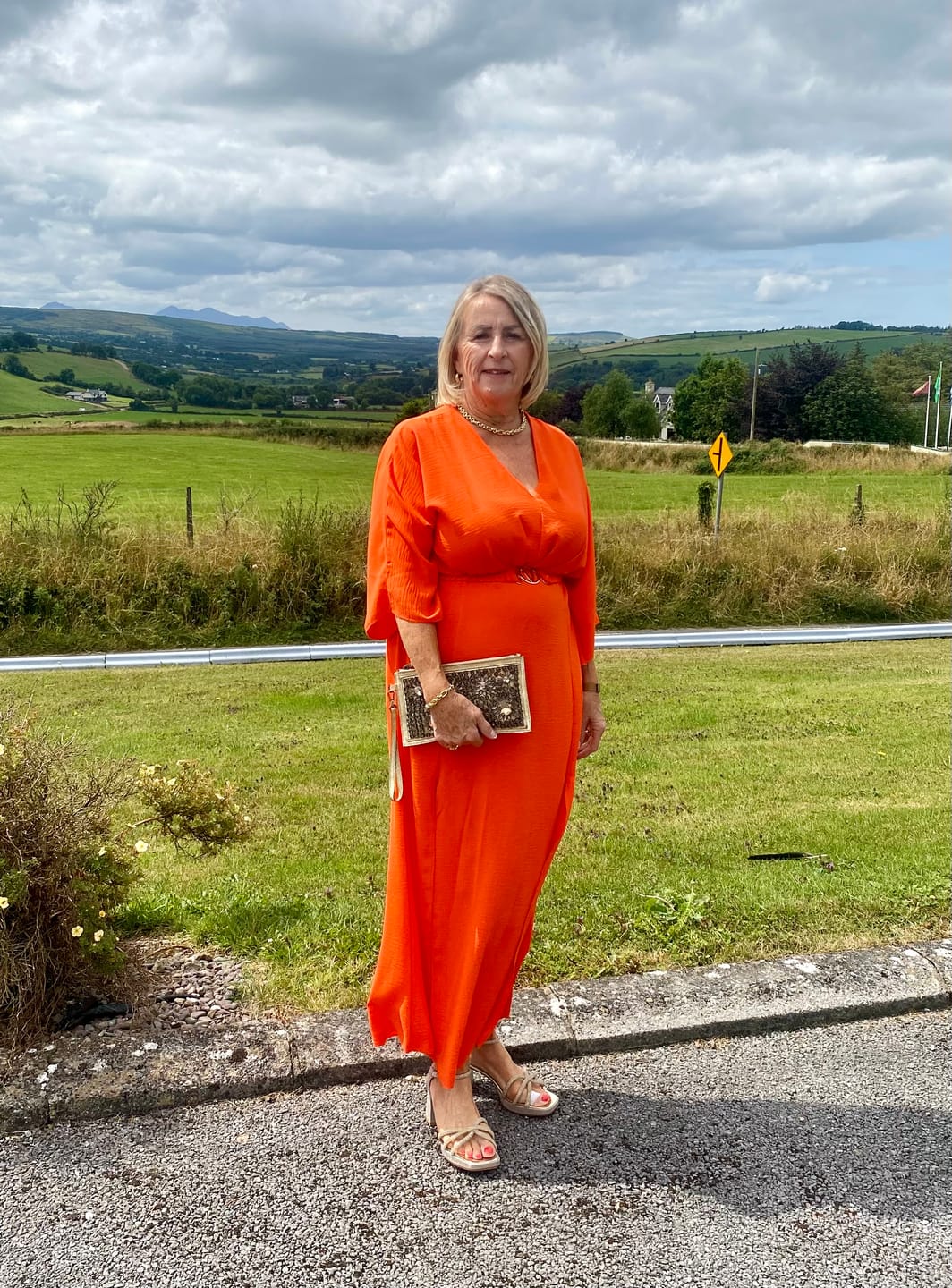 Customer photo review of Avery Orange Front Slit Dress