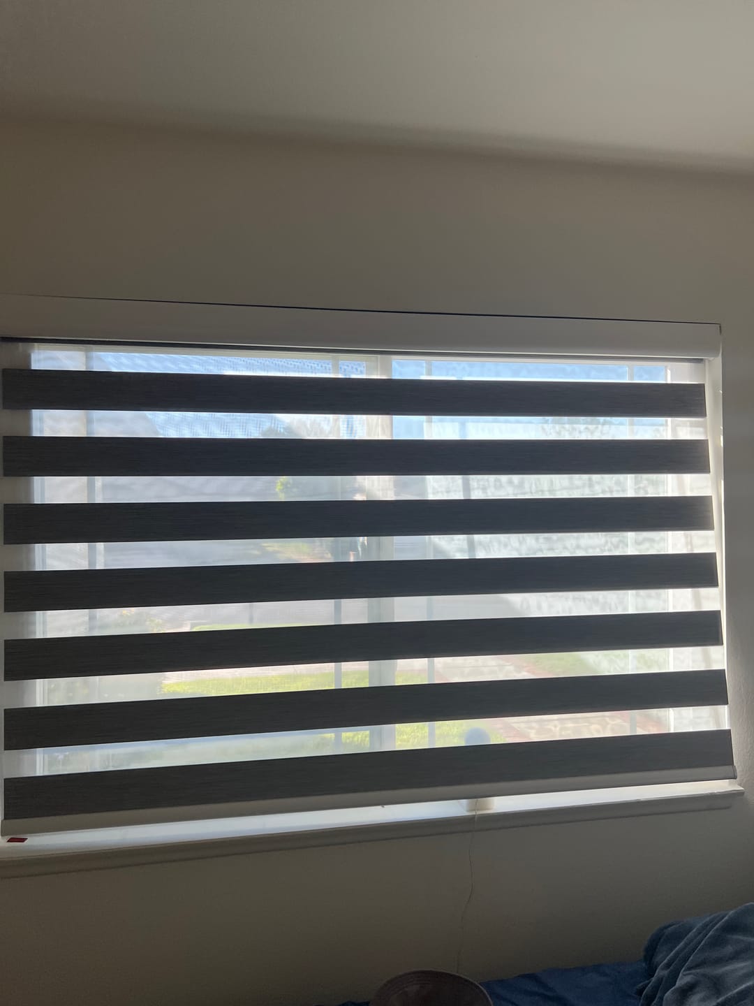 Customer photo review of Bringnox No Drill Motorized Zebra Roller Blinds 100% Blackout