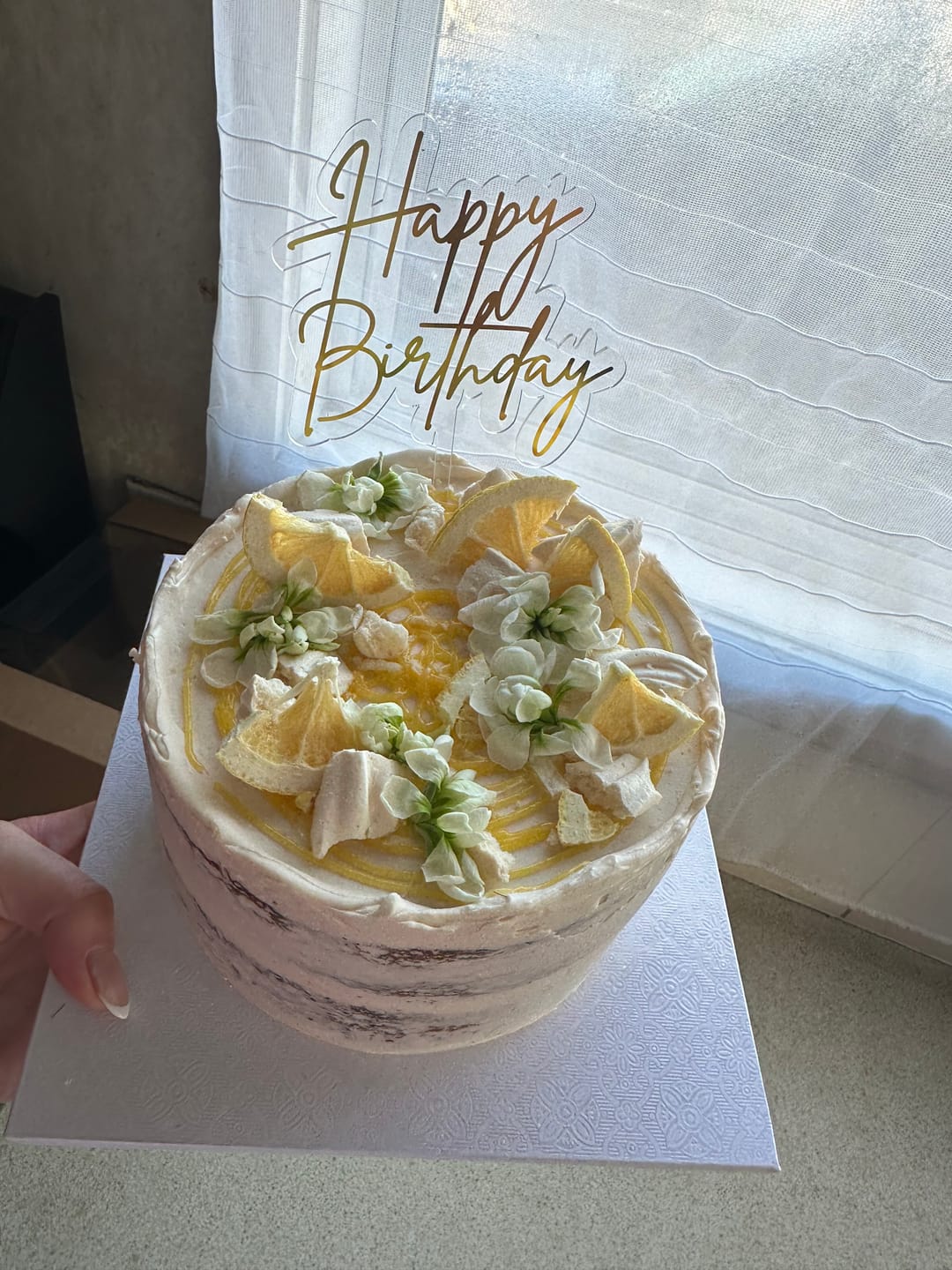 Customer photo review of lemon meringue cake