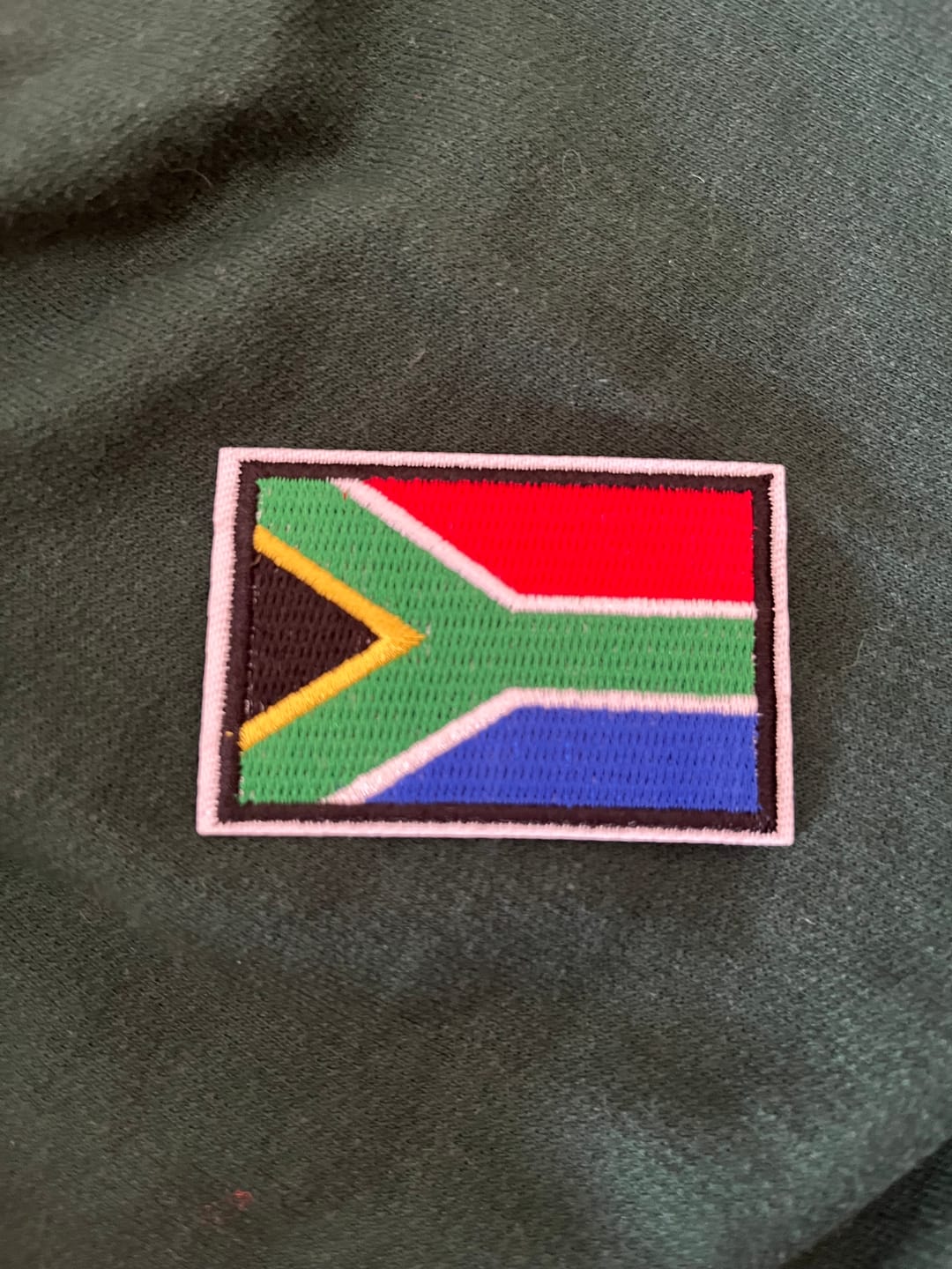 Customer photo review of Motif Iron On Badge - SA FLAG Medium (60x40mm)