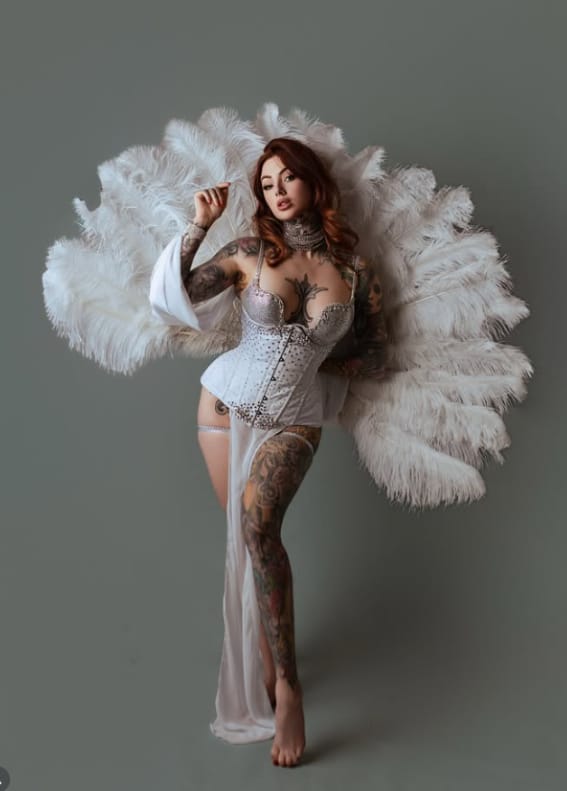 Customer photo review of 2 Layers Ostrich Feather Fan 12 Staves 30" x 54" | Intermediate Stage Look