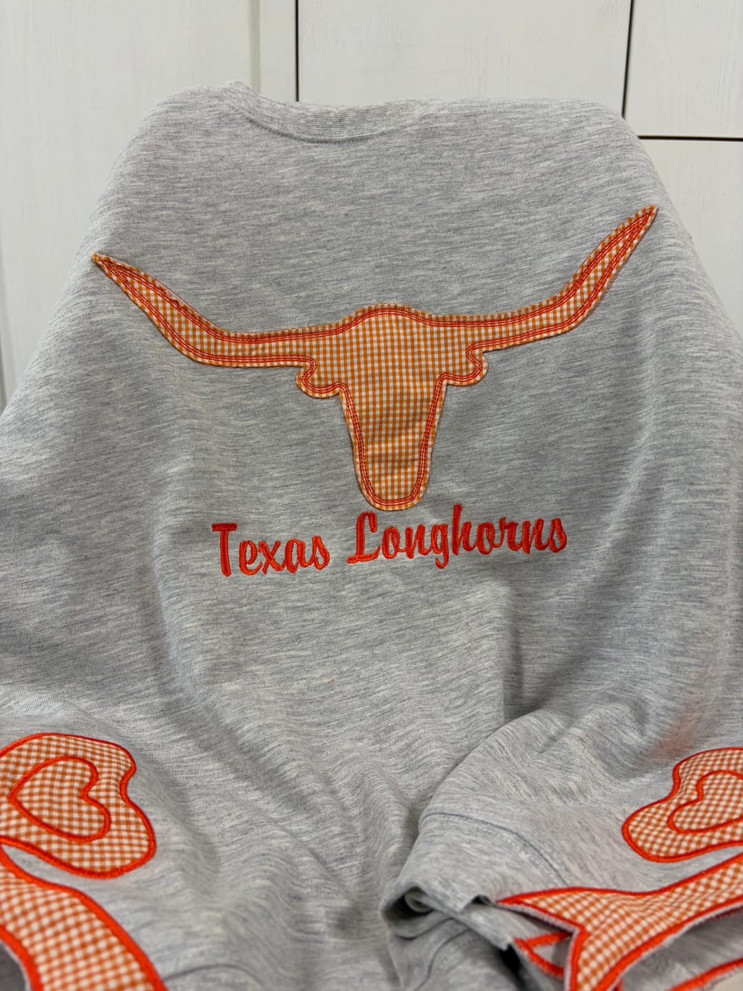 Customer photo review of Custom Tennessee Volunteers Women’s Team Spirit Sweatshirt – Applique Embroidered Side Bow Pullover