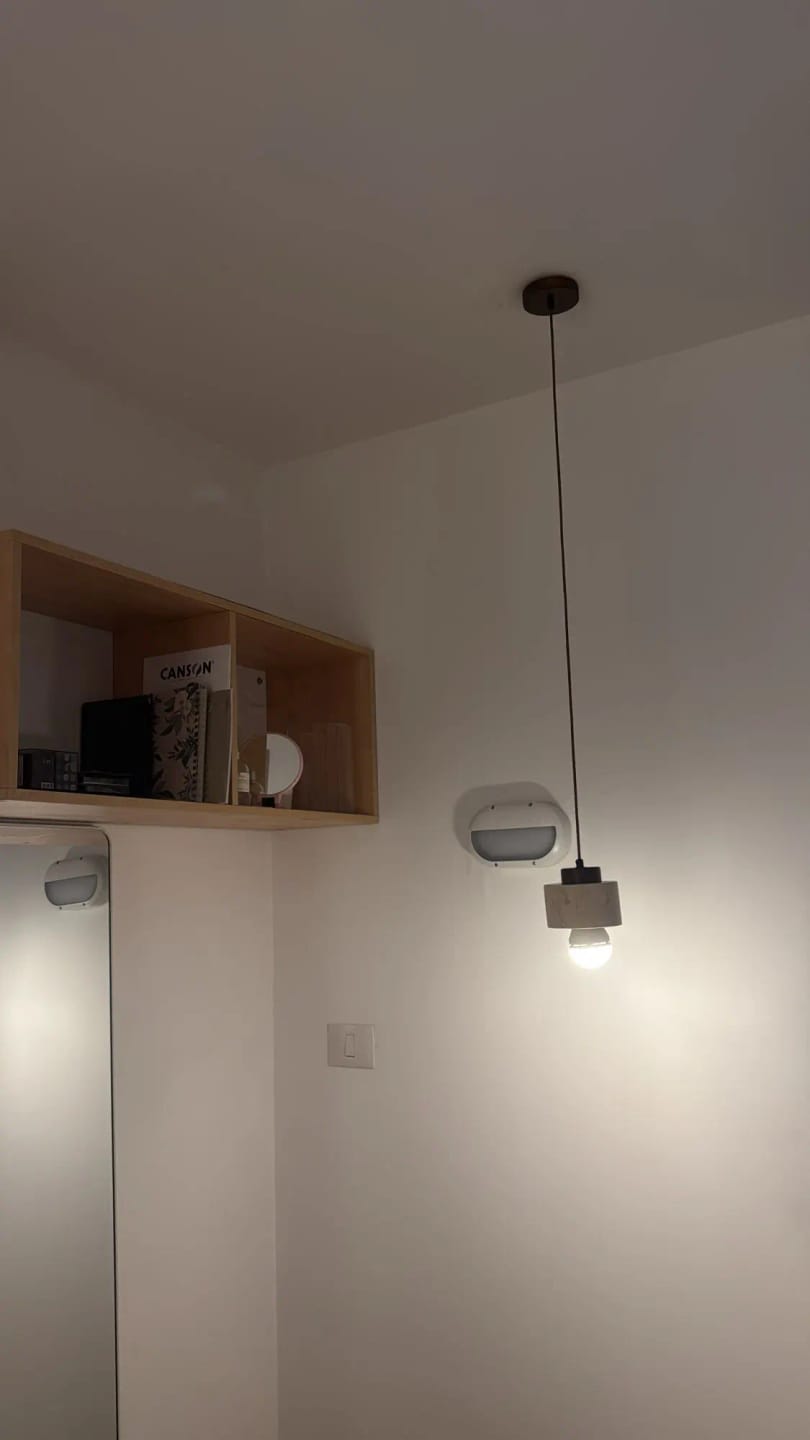 Customer photo review of Stone Pendant Light With Textured Shade And Wooden Accent 12 Inch