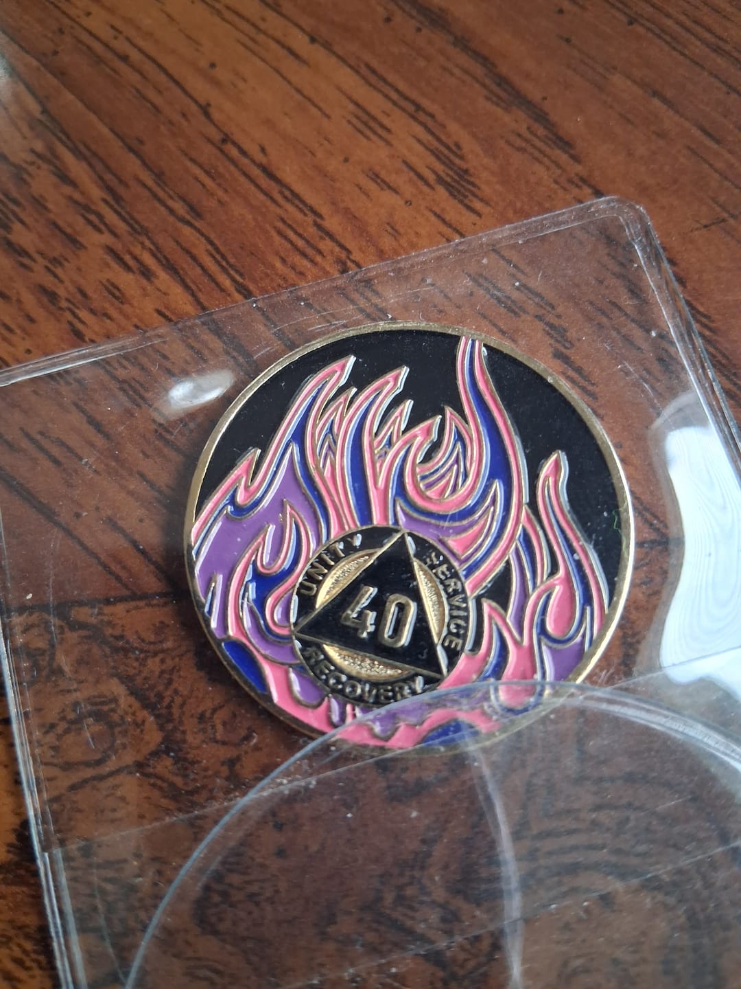 Customer photo review of 40 Year Sobriety Mint Twisted Flames Gold Plated AA Recovery Medallion - Forty Year Chip/Coin - Black/Pink/Purple/Blue