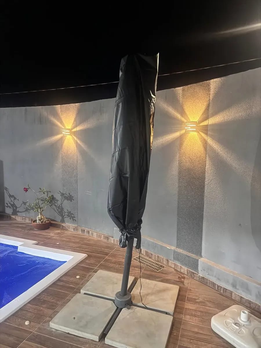 Customer photo review of Capa Impermeável para Guarda-Sol e Ombrelone 210D
