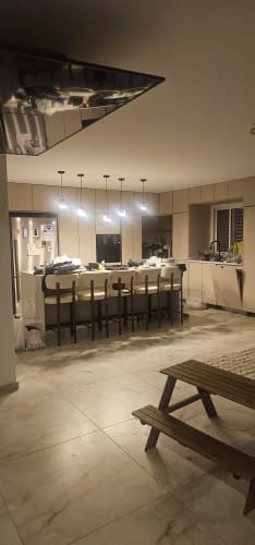 Customer photo review of Stone Pendant Light With Textured Shade And Wooden Accent 12 Inch