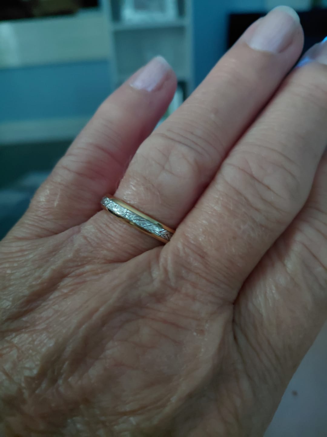 Customer photo review of The Golden Steel 4mm Wonder Ring