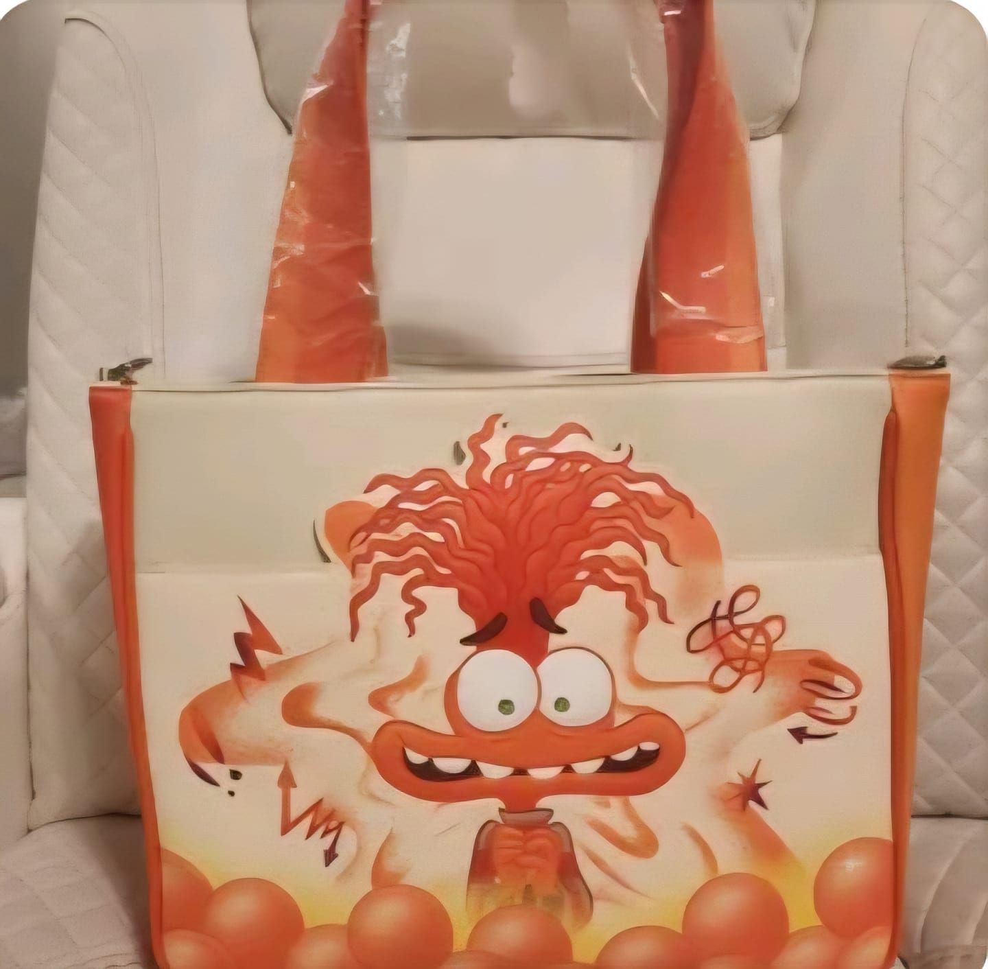 Customer photo review of Loungefly Disney Pixar Inside Out 2 Anxiety Glow Tote Bag with Coin Bag