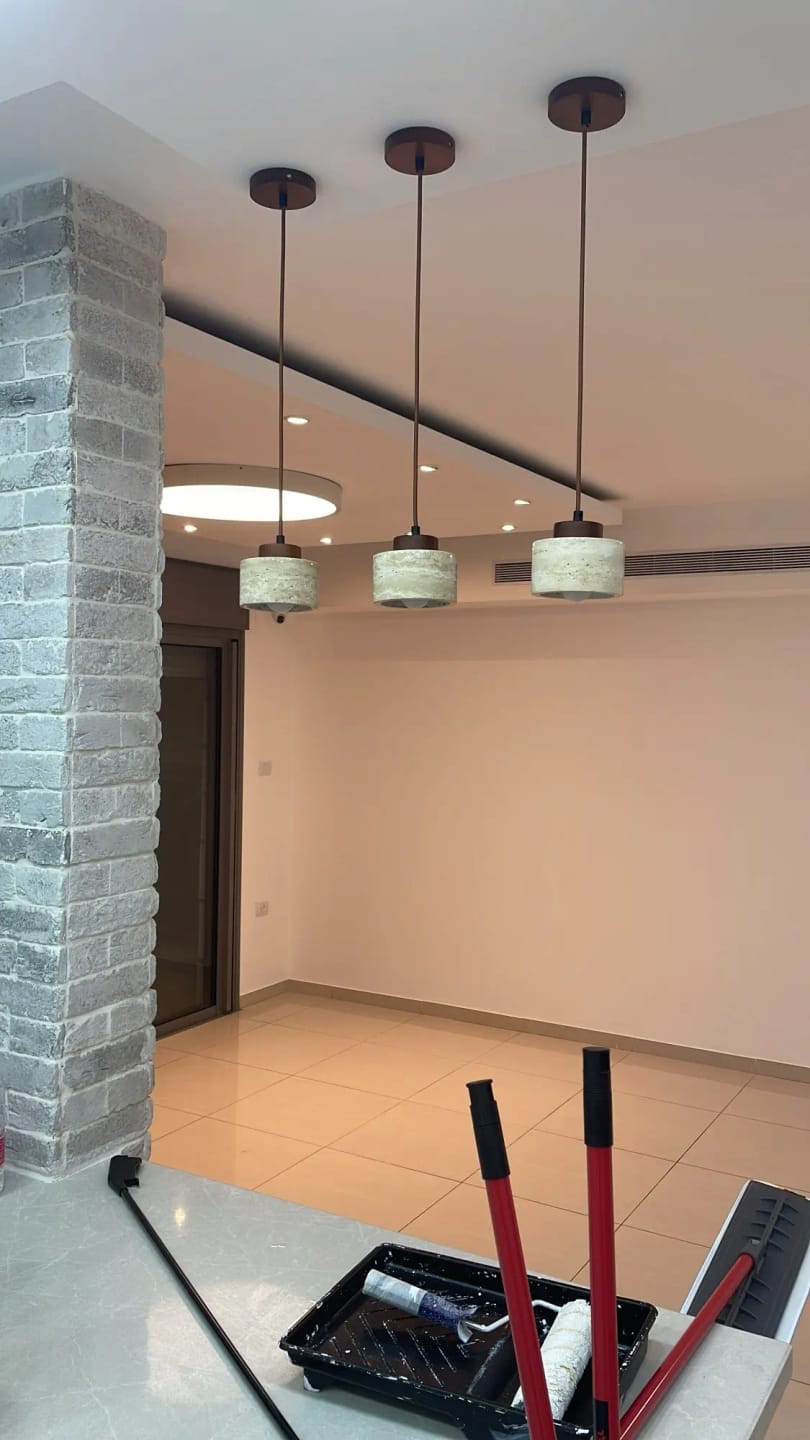 Customer photo review of Stone Pendant Light With Textured Shade And Wooden Accent 12 Inch