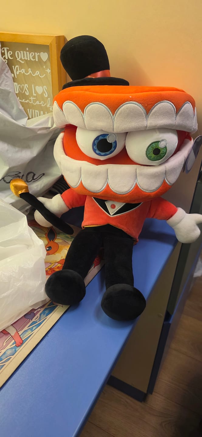Customer photo review of Caine Puppet Plush