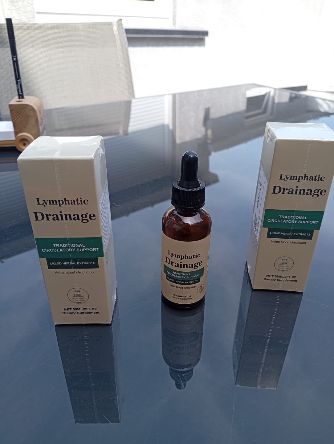 Customer photo review of Gouttes lymphatiques Nuvea – Soulagement naturel de la rétention d'eau au niveau du visage, de l'abdomen et des jambes