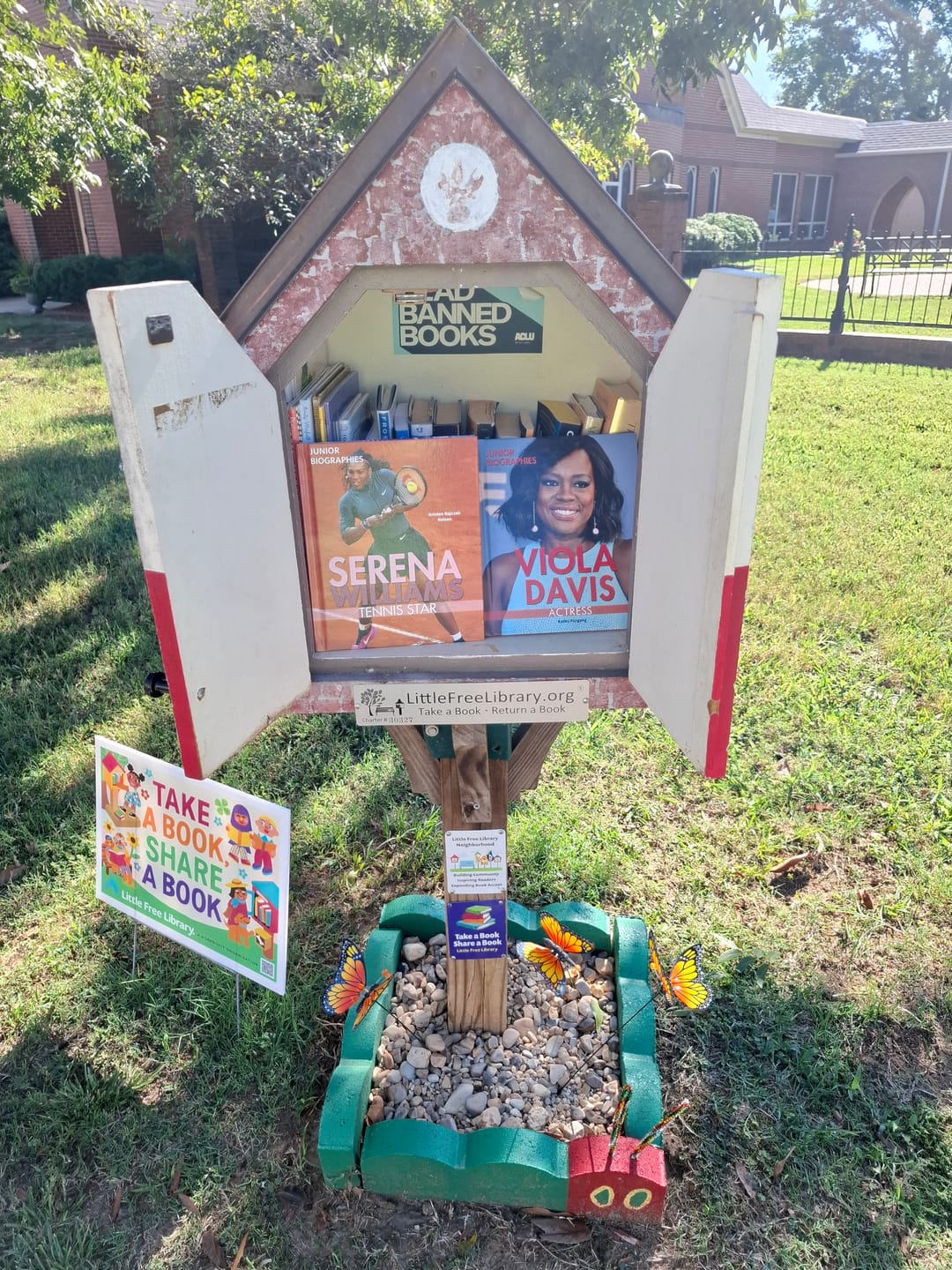 Customer photo review of Take a Book Share a Book Yard Sign