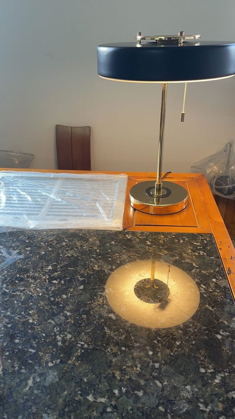 Customer photo review of Revolve Table Lamp, Spun Metal Shade, Opal Diffuser, Iron Base, G9