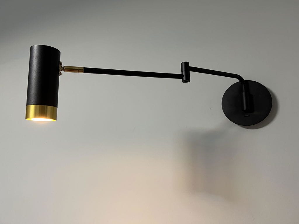 Customer photo review of Swing Arm Wall Lamp, Elongated Metal Shade, E26/E27, Adjustable