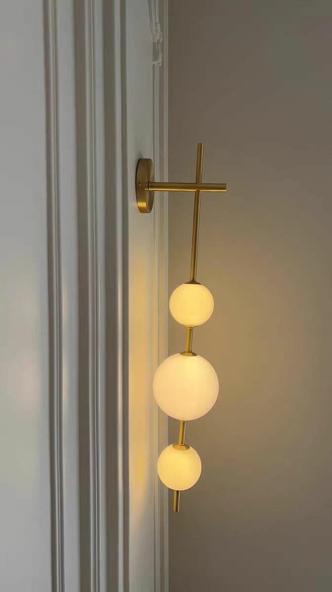 Customer photo review of Wall Lamp, Stacked Glass Globes, Matte White Shades, Integrated LED, Dimmable