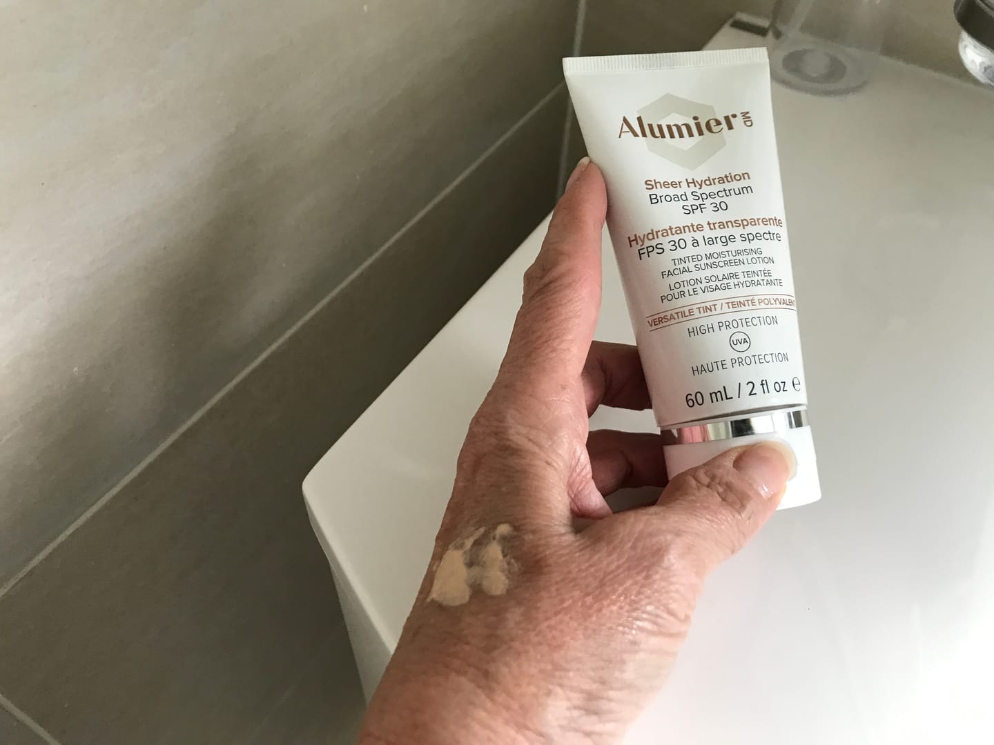 Customer photo review of Alumier Sheer Hydration Broad Spectrum SPF 30 (Versatile Tint) (60ml)