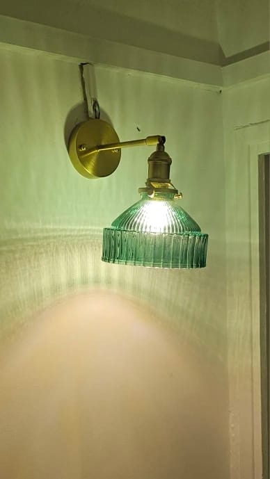 Customer photo review of Nordic Brass Wall Sconce, Flower-Shaped Green Glass Shade, One-Bulb Fixture
