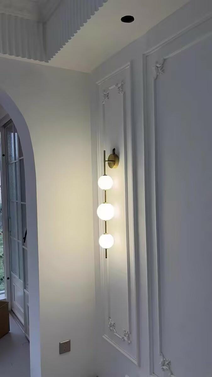 Customer photo review of Wall Lamp, Stacked Glass Globes, Matte White Shades, Integrated LED, Dimmable