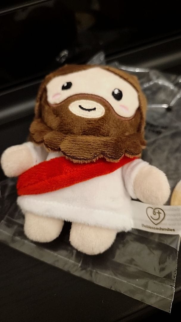 Customer photo review of Mini Jesus Plush Bag Charm