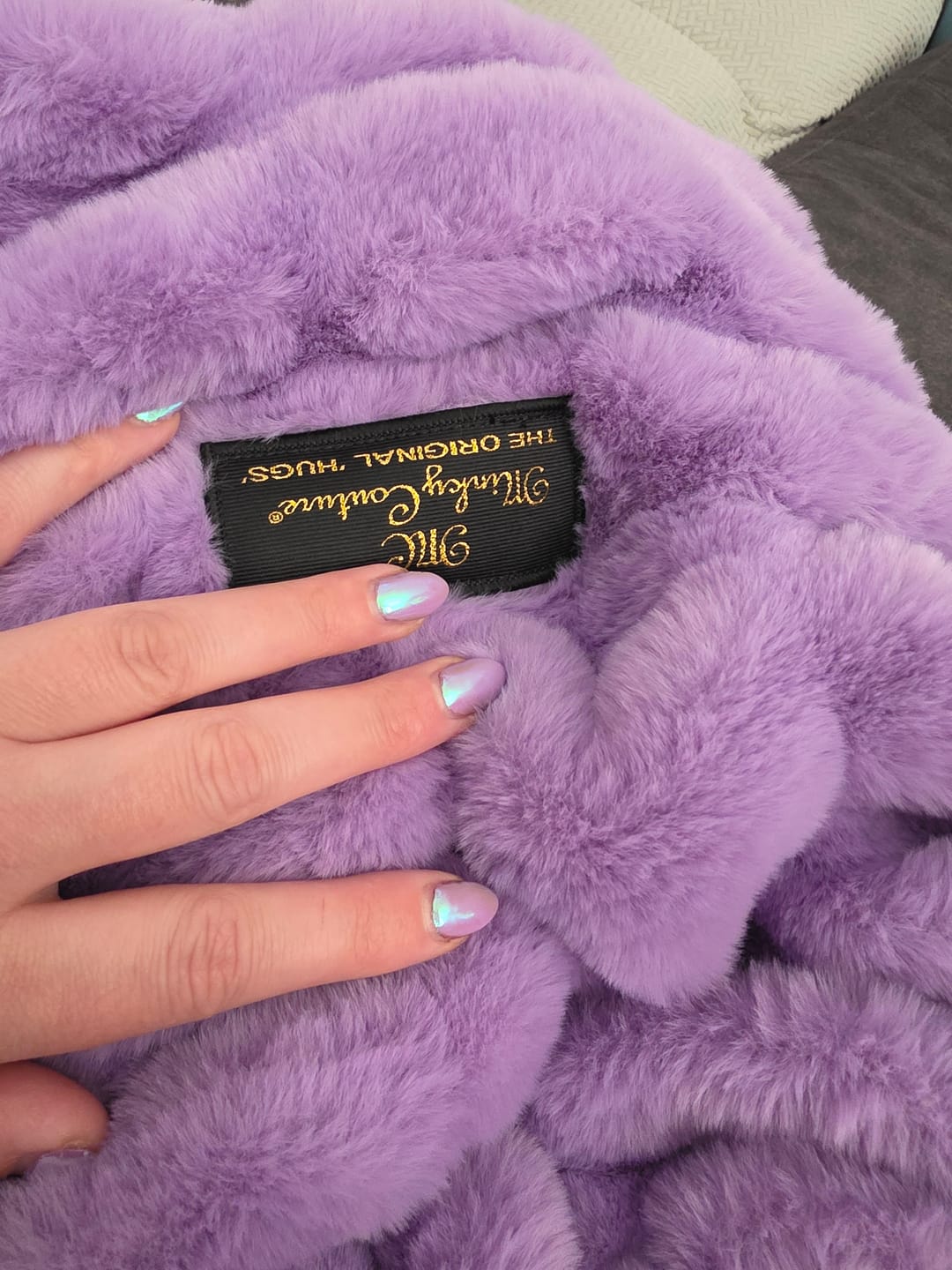 Customer photo review of Hugs Orchid Blanket
