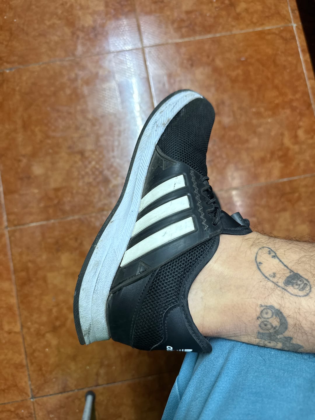 Customer photo review of Paq 6 Pares Tenis 018 Negro Blanco 25/28.5
