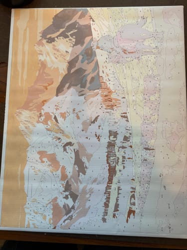 Reviewer's Number Remover Marker paint-by-numbers canvas featuring a scenic landscape, partially painted.