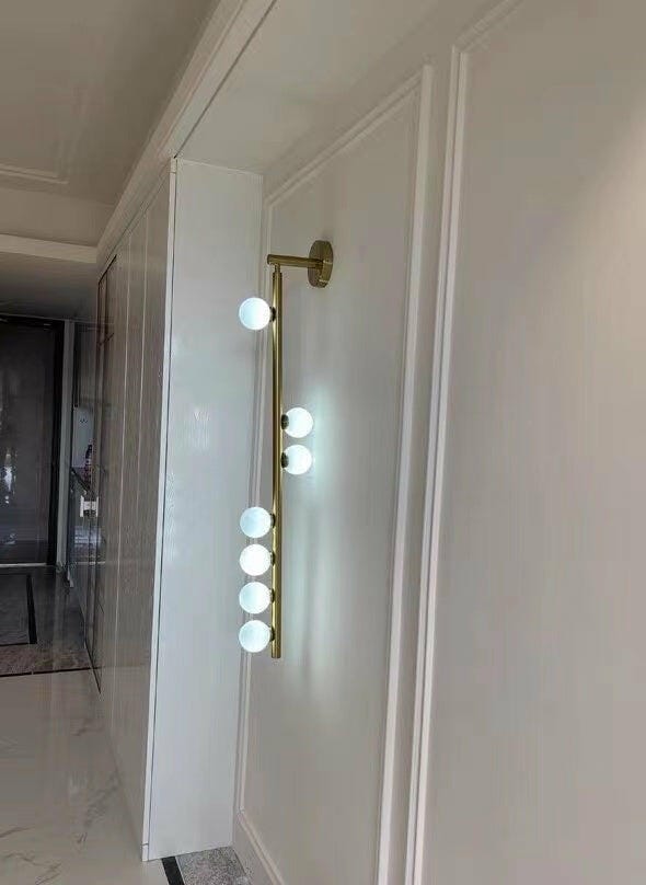 Customer photo review of Glass Tube Wall Lamp, Blown Glass Globes, Brass Finish, G4 LED