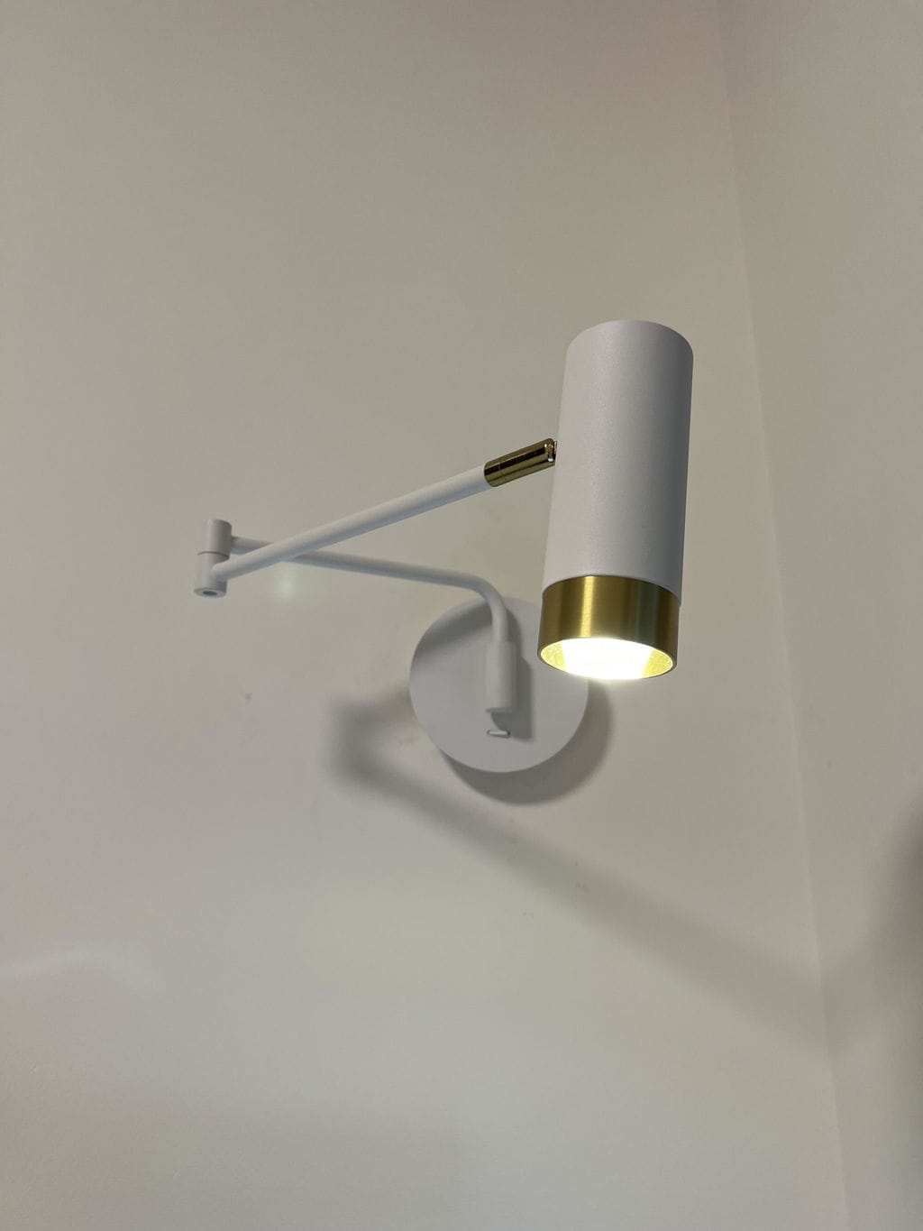 Customer photo review of Swing Arm Wall Lamp, Elongated Metal Shade, E26/E27, Adjustable