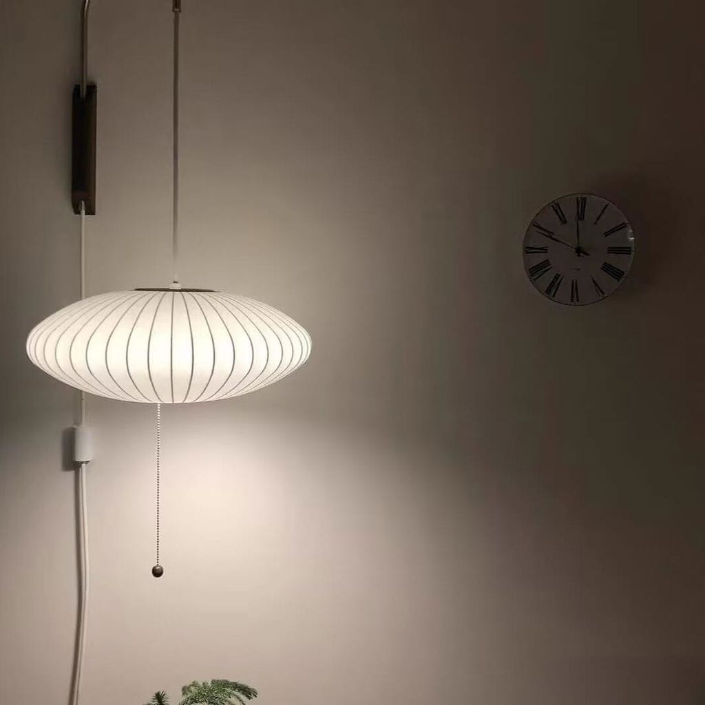 Customer photo review of Wall Sconce, White Polymer Shade, Walnut & Chrome, Swivel Plug-In E26