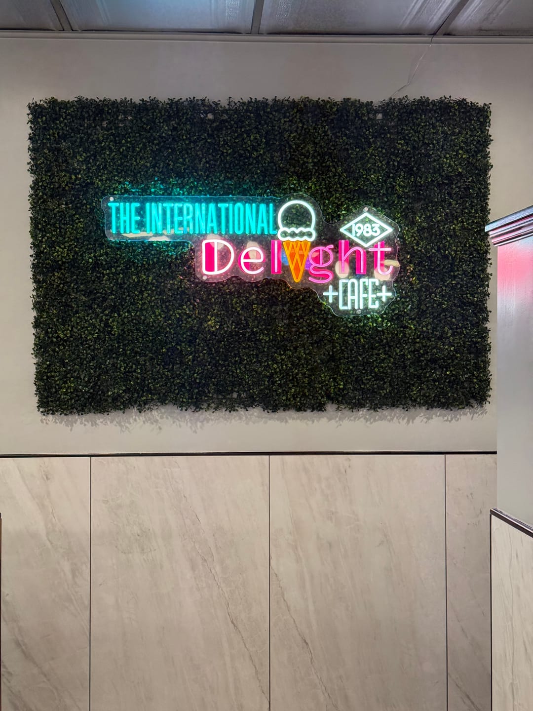 Customer photo review of THE INTERNATIONAL DELIGHT CAFE - Premium Neon Artwork
