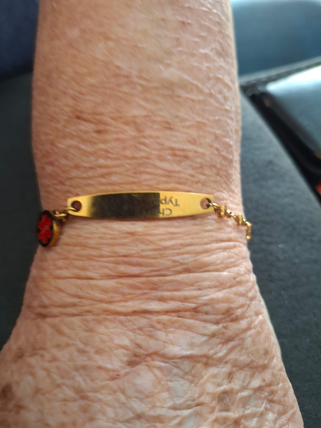 Customer photo review of Personalised Medical Alert Heart Link Bracelet - Gold Colour