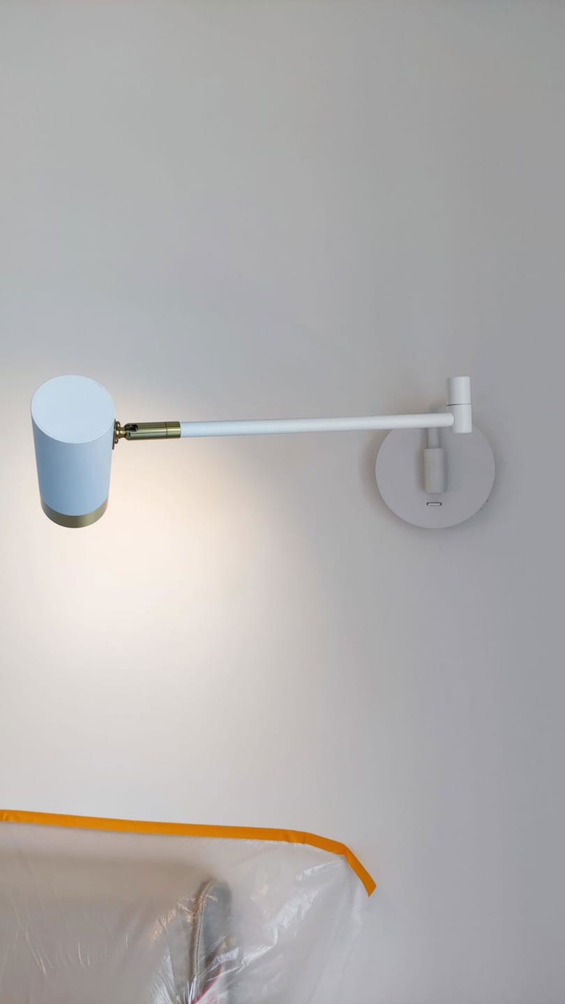 Customer photo review of Swing Arm Wall Lamp, Elongated Metal Shade, E26/E27, Adjustable