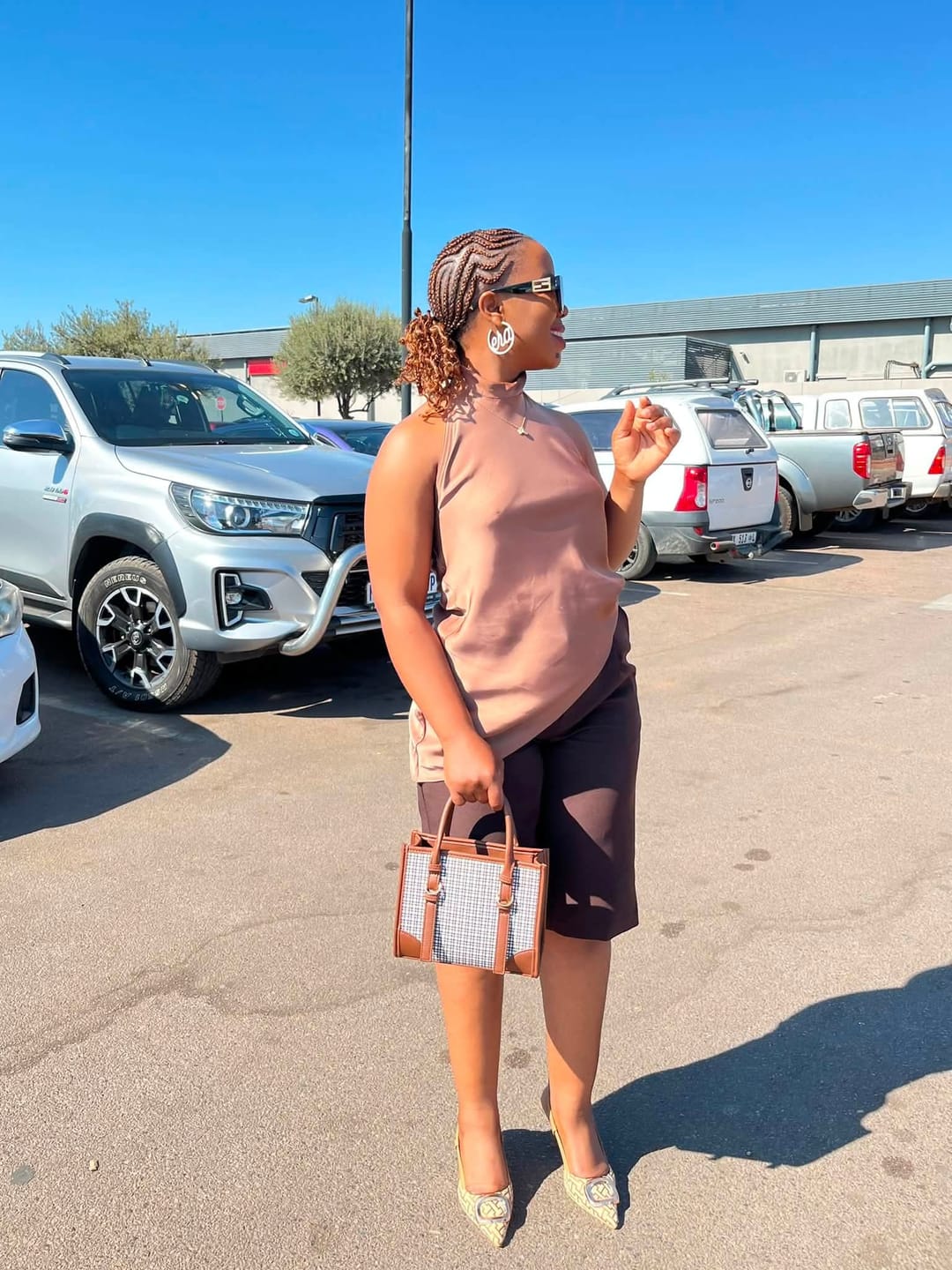 Customer photo review of Gold Luxe Logo Hoops