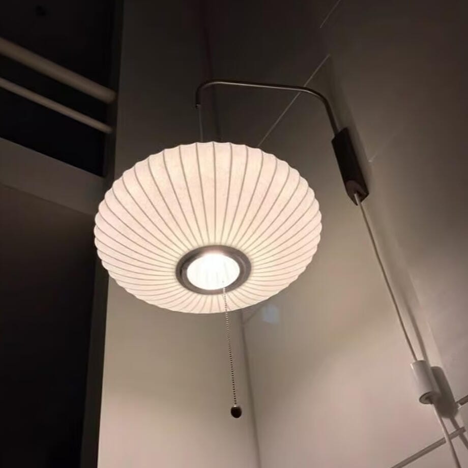 Customer photo review of Wall Sconce, White Polymer Shade, Walnut & Chrome, Swivel Plug-In E26