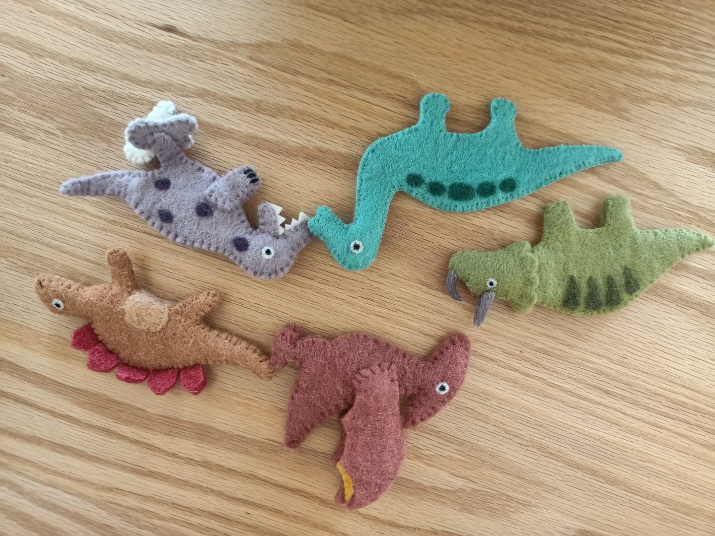 Customer photo review of Dinosaur Finger Puppets Set