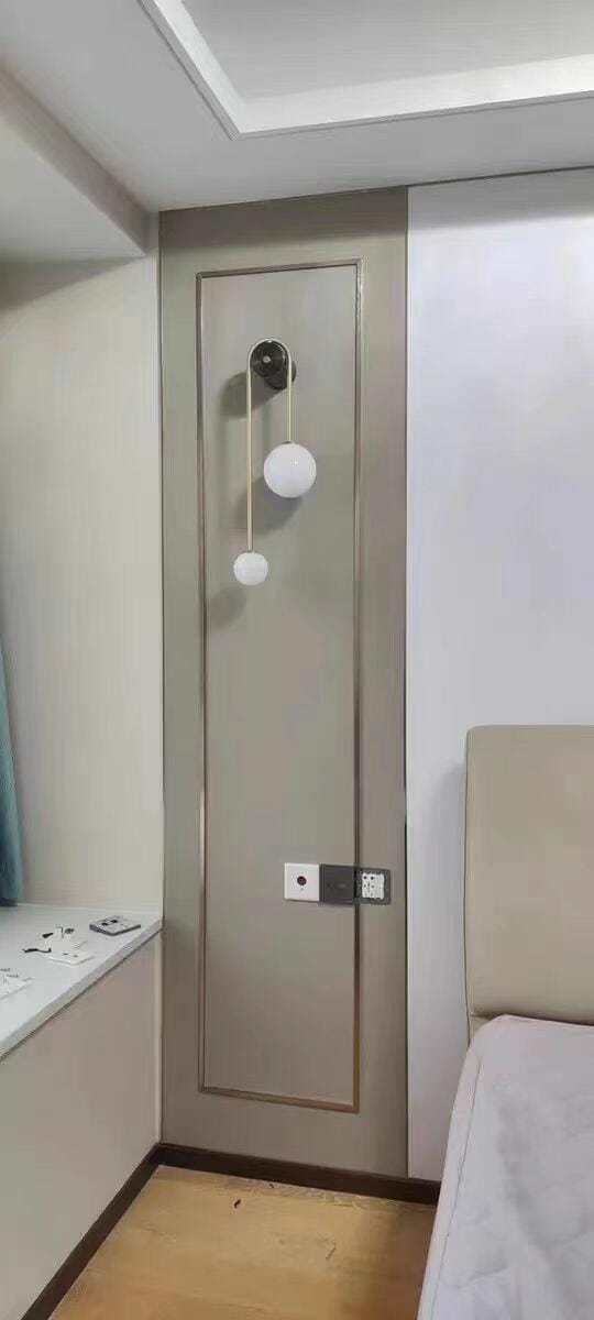 Customer photo review of Brass Arc Wall Light, Curved Arm, Two White Glass Shades, G9
