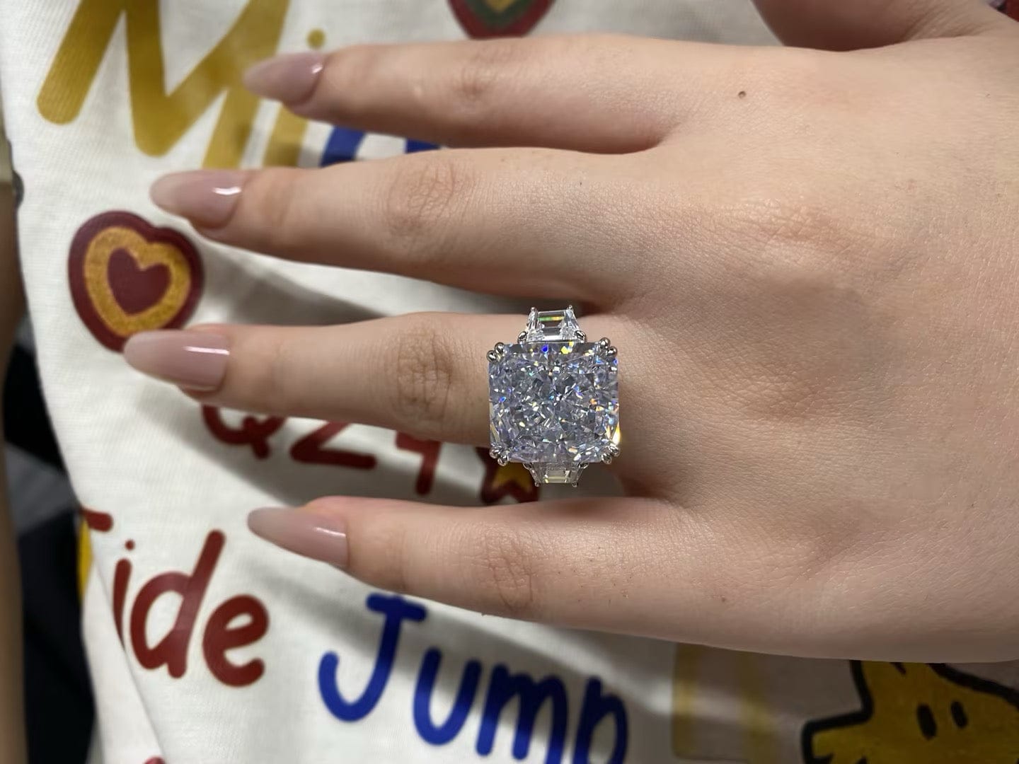 Customer photo review of S925 6.5/12.0 Ct Radiant Cut Crushed Ice Simulated Diamond Three-Stone Engagement Travel Ring